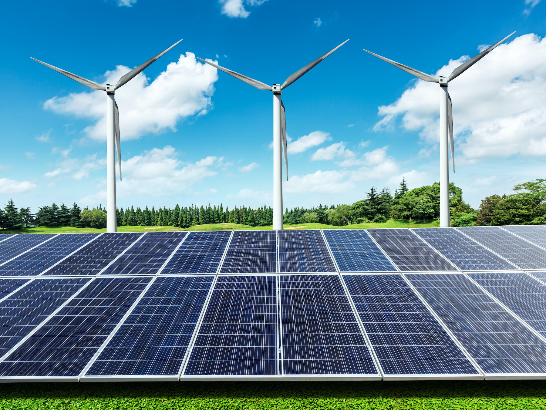 Renewable energy examples - solar panels and wind turbines