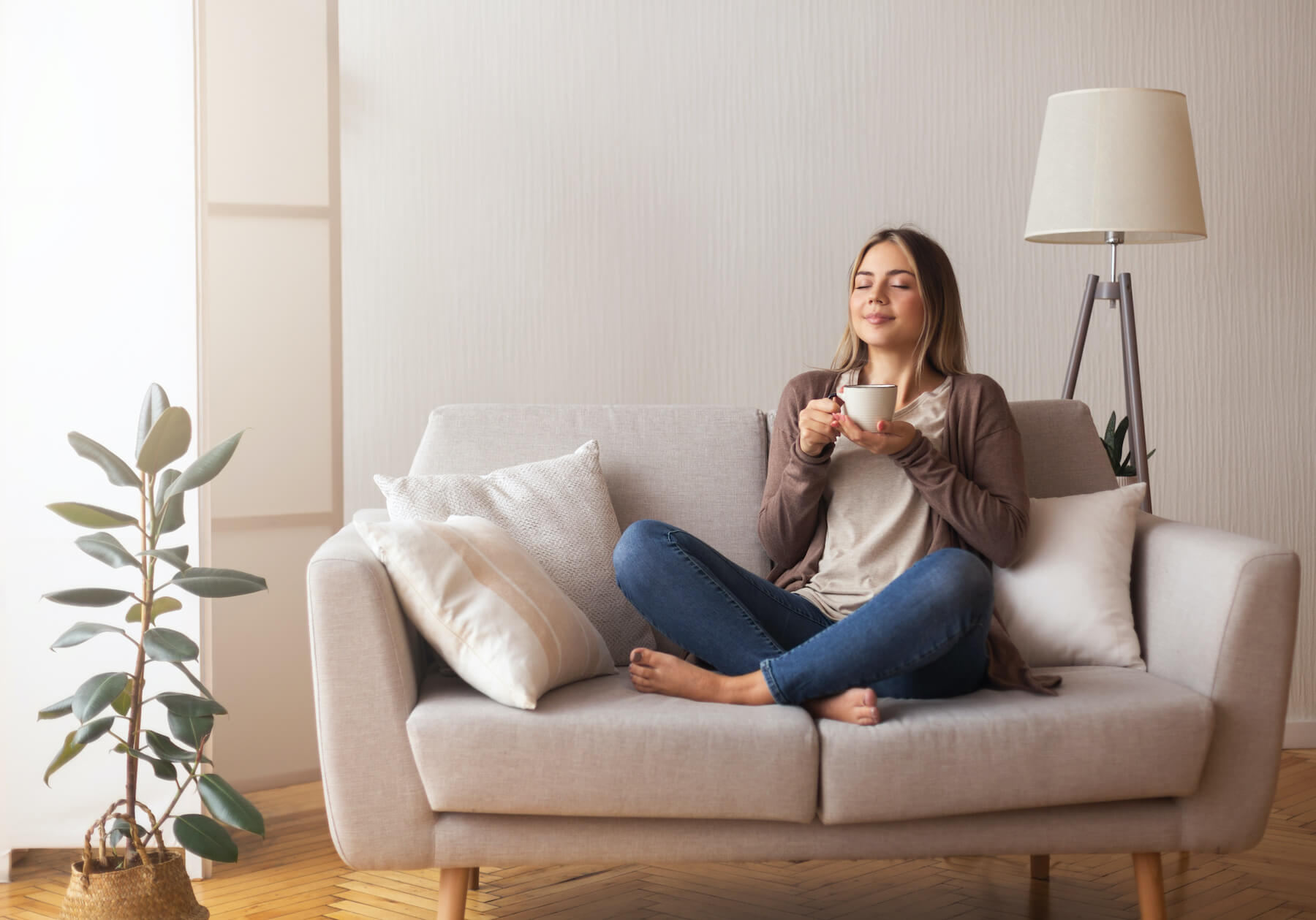 woman enjoying her warm heating system